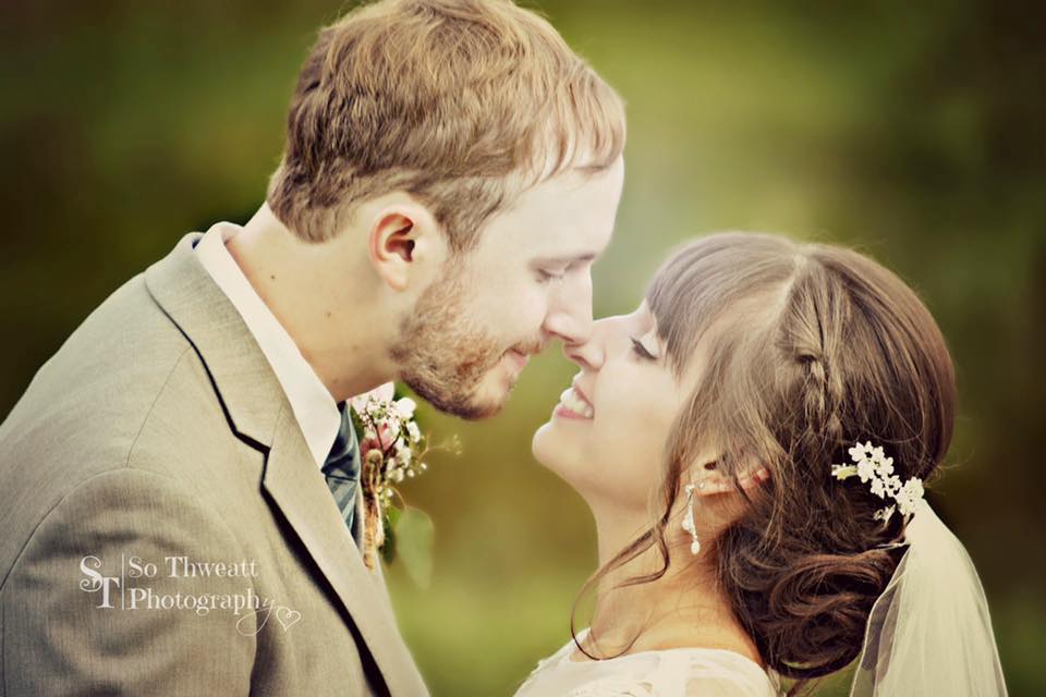 Bride and groom embracing 